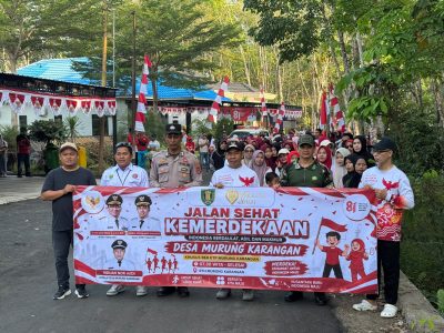 Polsek Muara Harus Amankan Kegiatan Jalan Sehat HUT RI Ke-81 di Desa Murung Karangan