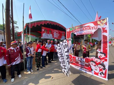 Polsek Muara Harus Dampingi Pelepasan Napak Tilas HUT RI ke-81 di Desa Masintan